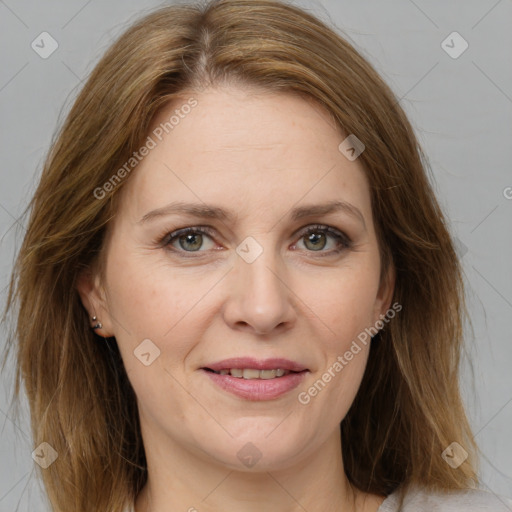 Joyful white adult female with medium  brown hair and brown eyes