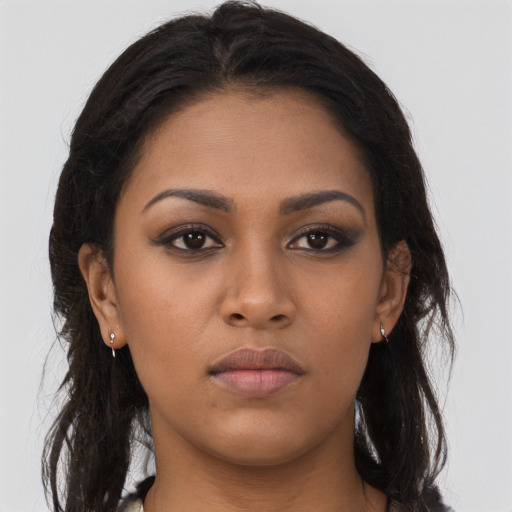 Neutral latino young-adult female with long  brown hair and brown eyes