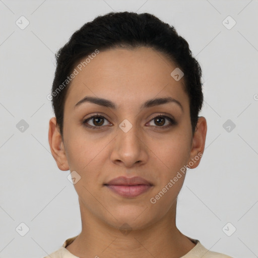 Joyful latino young-adult female with short  brown hair and brown eyes