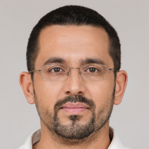Neutral white adult male with short  black hair and brown eyes