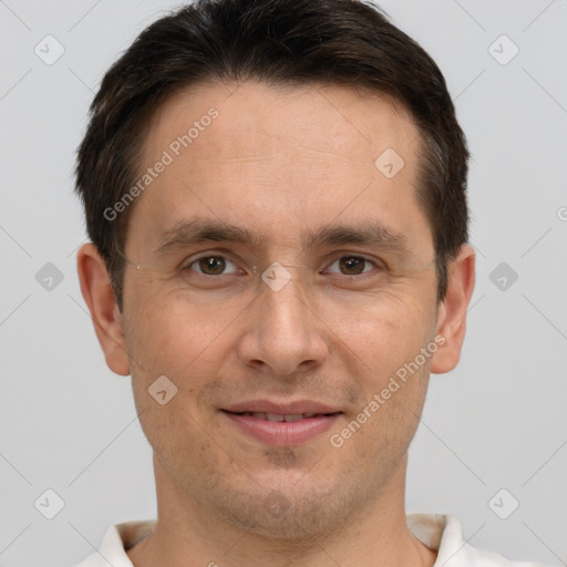 Joyful white adult male with short  brown hair and brown eyes