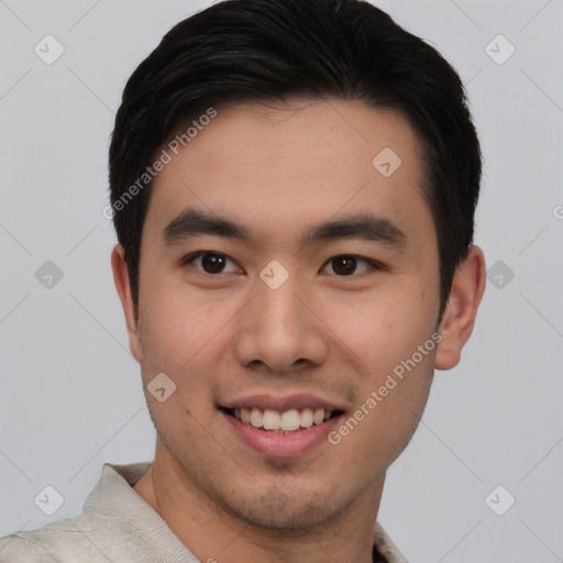 Joyful white young-adult male with short  black hair and brown eyes