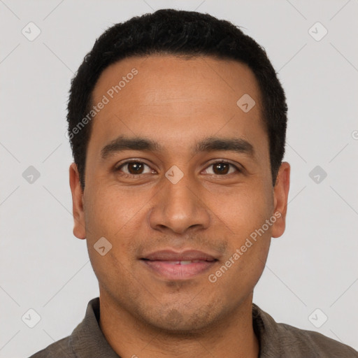 Joyful latino young-adult male with short  black hair and brown eyes