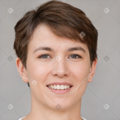 Joyful white young-adult female with short  brown hair and brown eyes