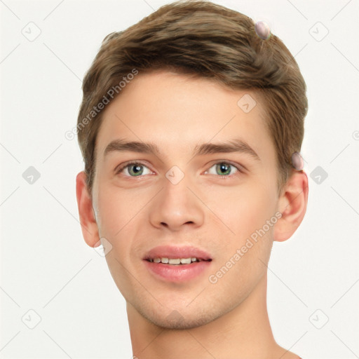 Joyful white young-adult male with short  brown hair and grey eyes