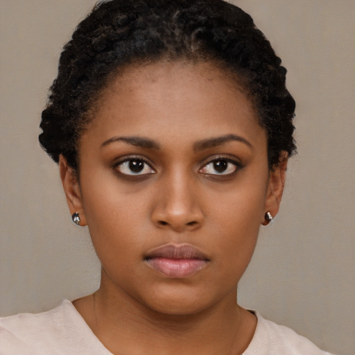 Neutral black young-adult female with short  brown hair and brown eyes