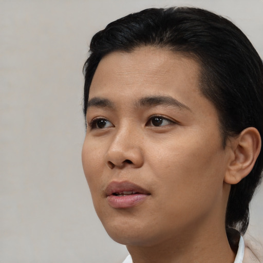 Neutral asian young-adult female with short  black hair and brown eyes