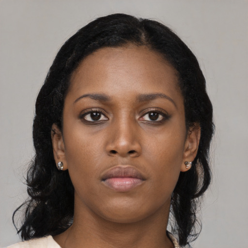 Neutral black young-adult female with long  black hair and brown eyes