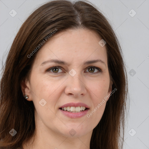 Joyful white young-adult female with long  brown hair and brown eyes