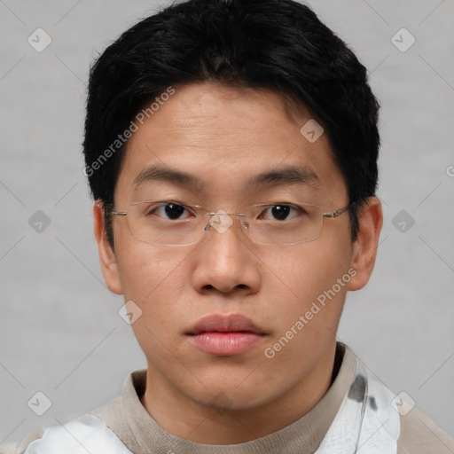 Neutral asian young-adult male with short  black hair and brown eyes
