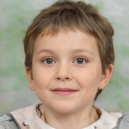 Joyful white child male with short  brown hair and brown eyes