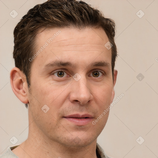 Joyful white adult male with short  brown hair and grey eyes