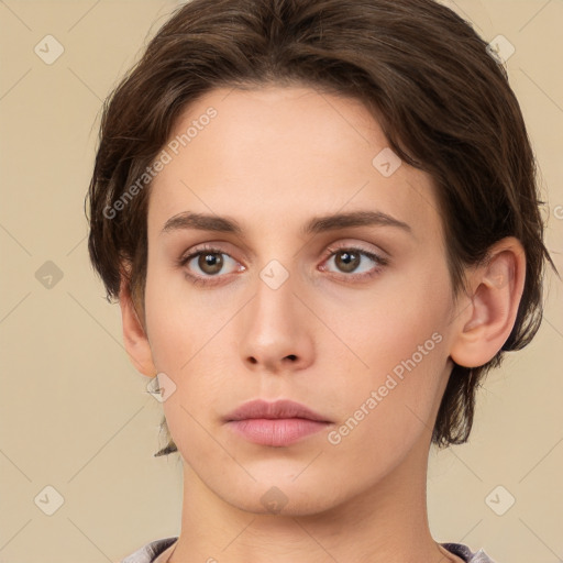 Neutral white young-adult female with short  brown hair and brown eyes