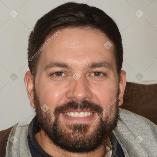 Joyful white adult male with short  brown hair and brown eyes