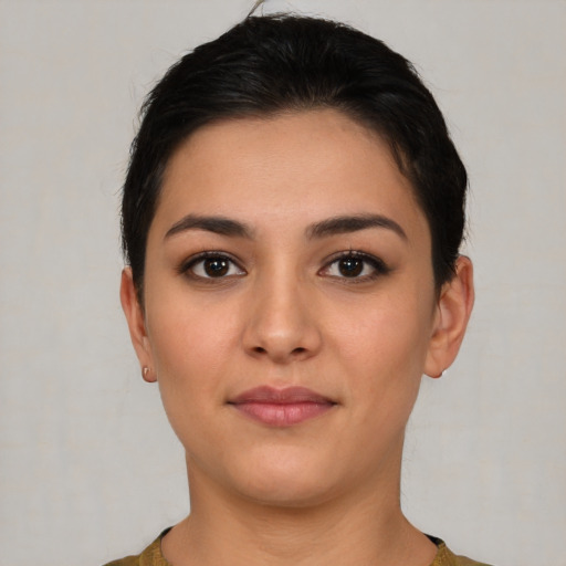 Joyful latino young-adult female with short  brown hair and brown eyes