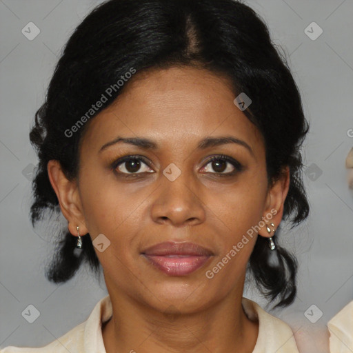 Joyful black adult female with medium  black hair and brown eyes