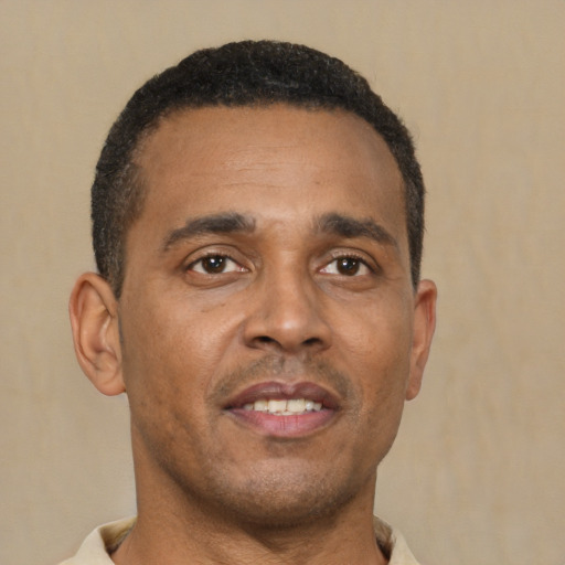 Neutral latino adult male with short  brown hair and brown eyes