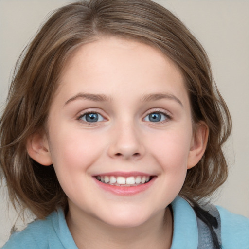 Joyful white child female with medium  brown hair and blue eyes