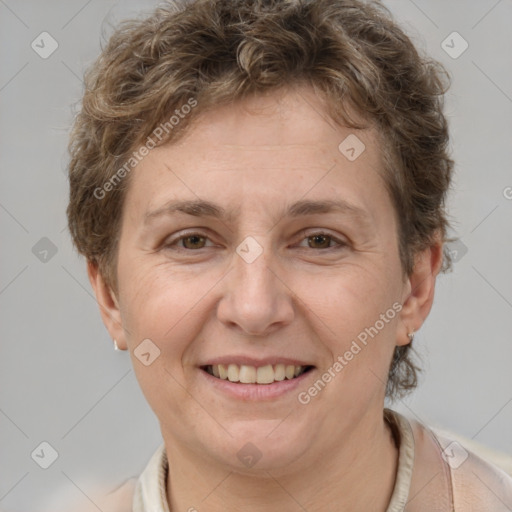 Joyful white adult female with short  brown hair and brown eyes