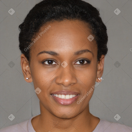 Joyful black young-adult female with short  black hair and brown eyes