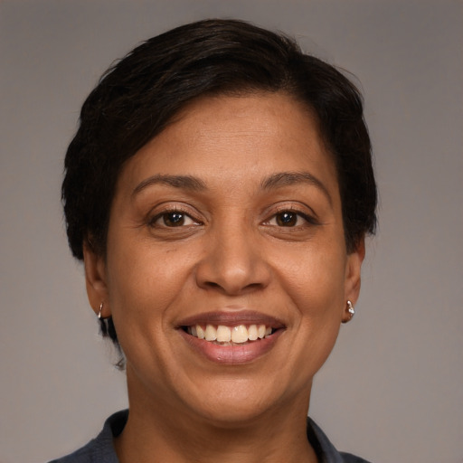 Joyful white adult female with short  brown hair and brown eyes