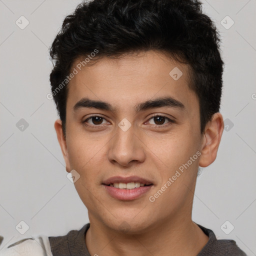 Joyful latino young-adult male with short  brown hair and brown eyes