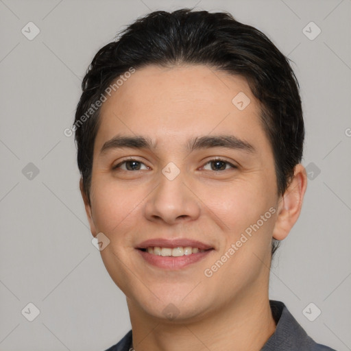 Joyful white young-adult male with short  black hair and brown eyes