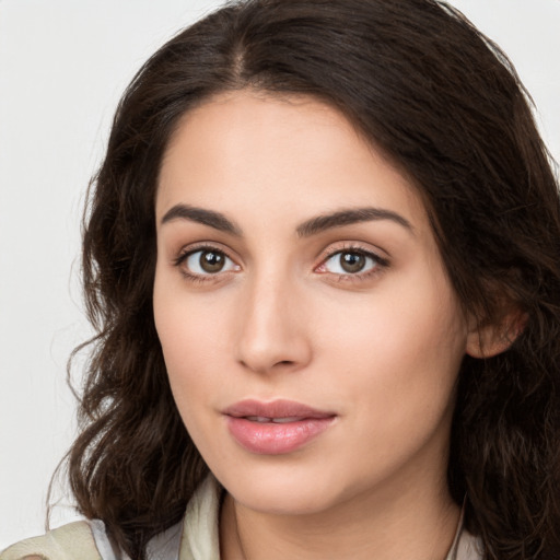 Neutral white young-adult female with long  brown hair and brown eyes