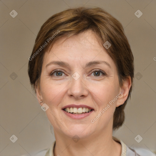 Joyful white adult female with medium  brown hair and grey eyes