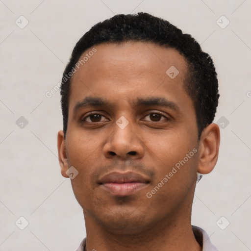 Neutral latino young-adult male with short  black hair and brown eyes