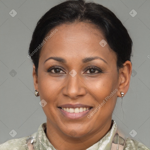 Joyful latino adult female with short  brown hair and brown eyes