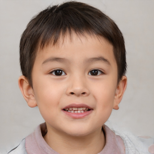 Joyful white child male with short  brown hair and brown eyes