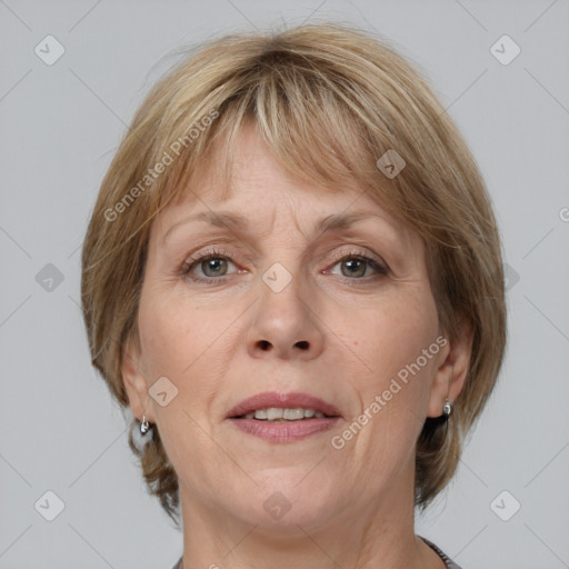 Joyful white adult female with medium  brown hair and grey eyes