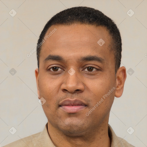 Neutral black young-adult male with short  black hair and brown eyes