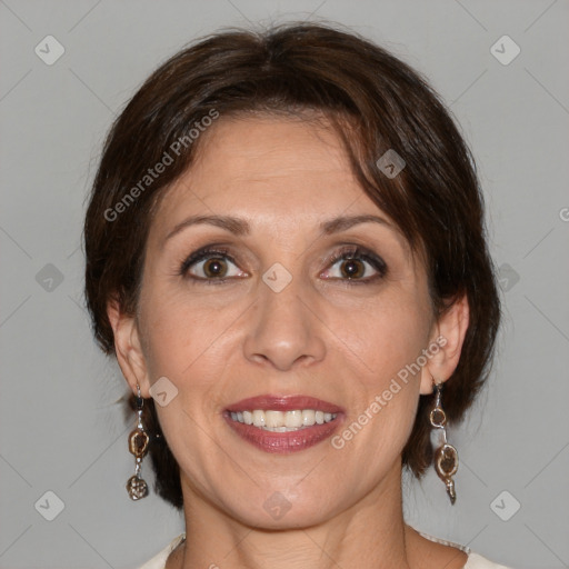 Joyful white adult female with medium  brown hair and brown eyes