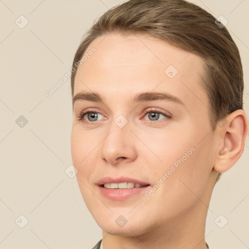 Joyful white young-adult female with short  brown hair and brown eyes