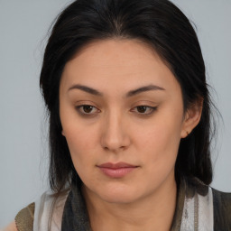 Neutral asian young-adult female with medium  brown hair and brown eyes