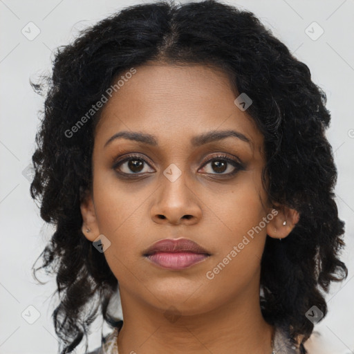 Neutral black young-adult female with long  brown hair and brown eyes