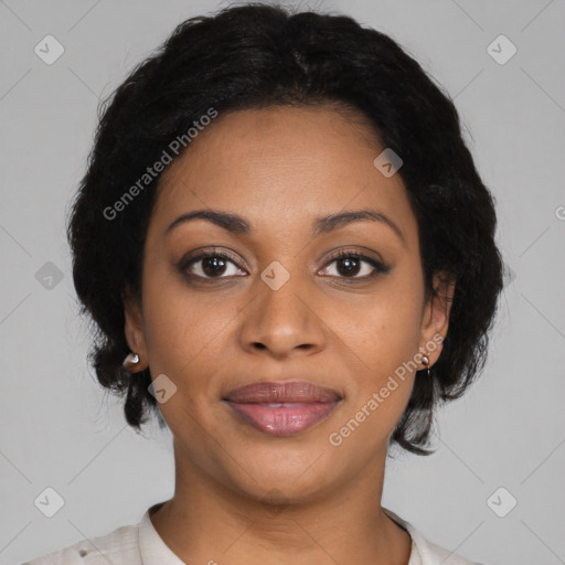 Joyful black young-adult female with medium  black hair and brown eyes