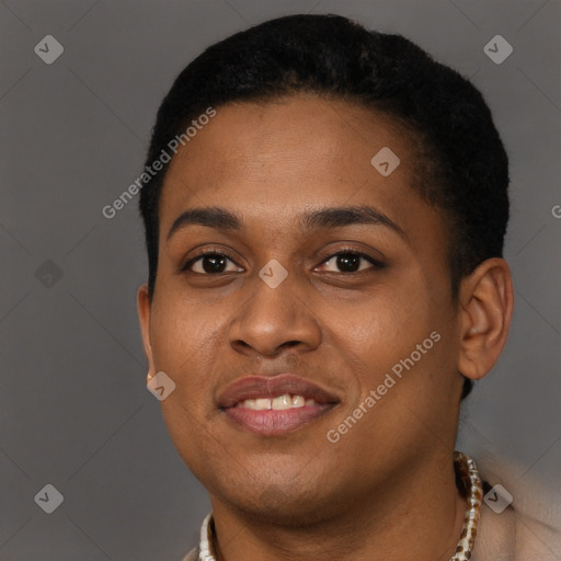Joyful black young-adult female with short  brown hair and brown eyes