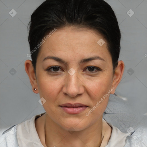 Joyful white adult female with short  brown hair and brown eyes