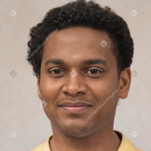 Joyful latino young-adult male with short  brown hair and brown eyes