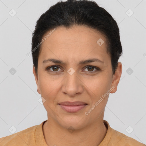 Joyful latino young-adult female with short  brown hair and brown eyes