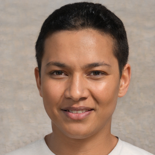 Joyful white young-adult male with short  black hair and brown eyes