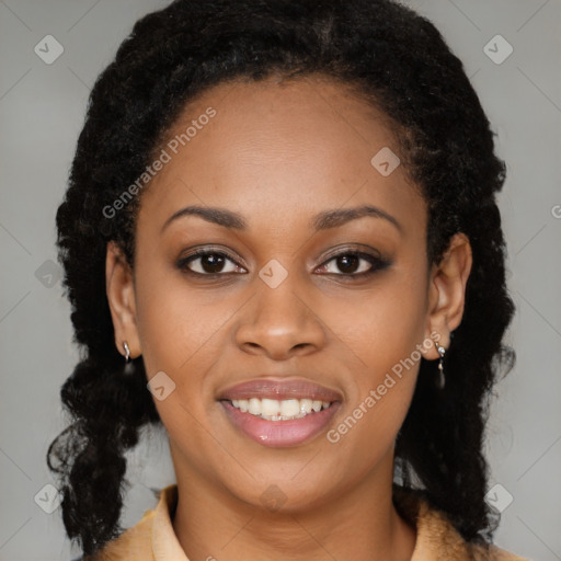 Joyful black young-adult female with long  brown hair and brown eyes