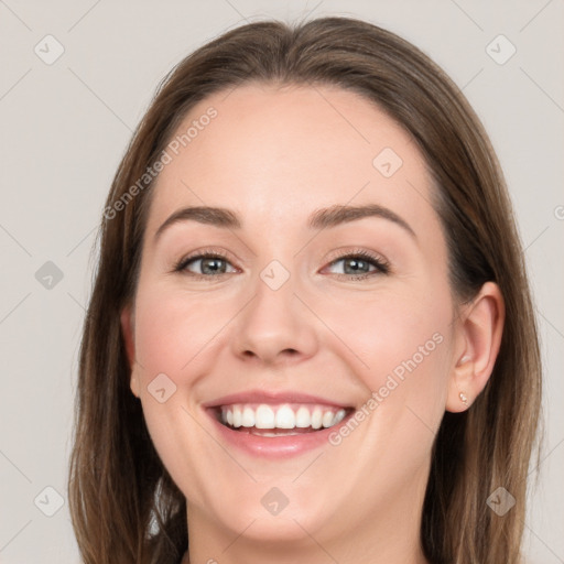 Joyful white young-adult female with long  brown hair and grey eyes