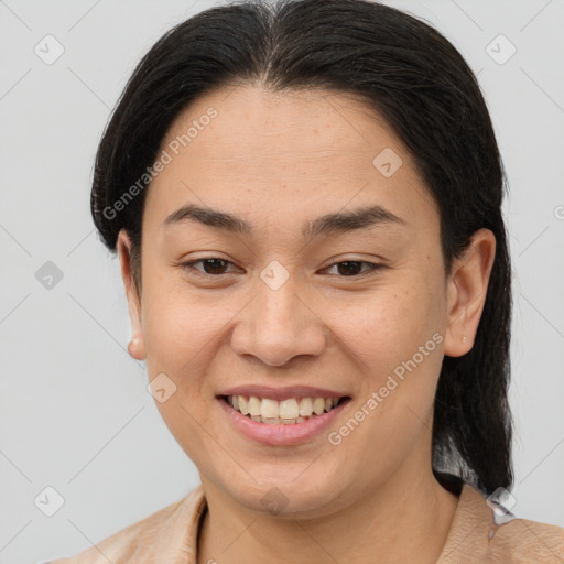 Joyful white young-adult female with medium  brown hair and brown eyes