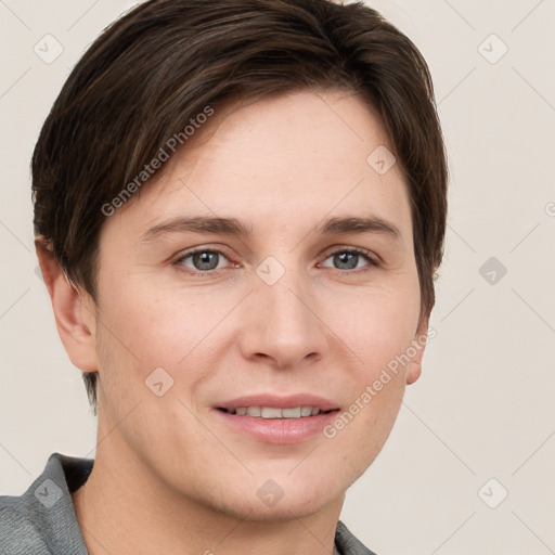 Joyful white young-adult female with short  brown hair and grey eyes