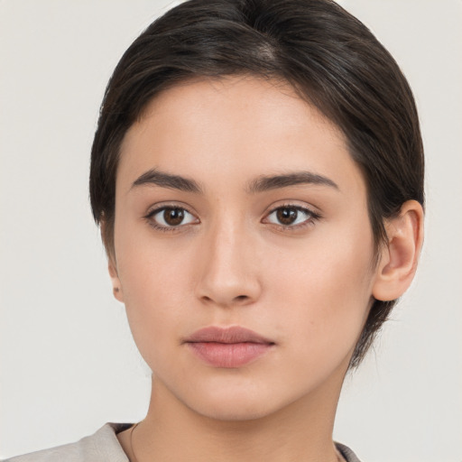 Neutral white young-adult female with short  brown hair and brown eyes