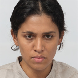 Neutral asian young-adult female with short  brown hair and brown eyes